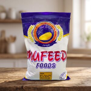 Pure Mufeed Rice Atta 500gm packet on a clean marble kitchen counter.