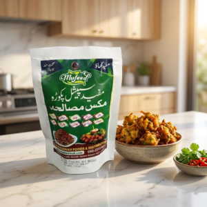 Mufeed Special Pakora Mix Masala 100g laminated stand-up pouch with green theme.